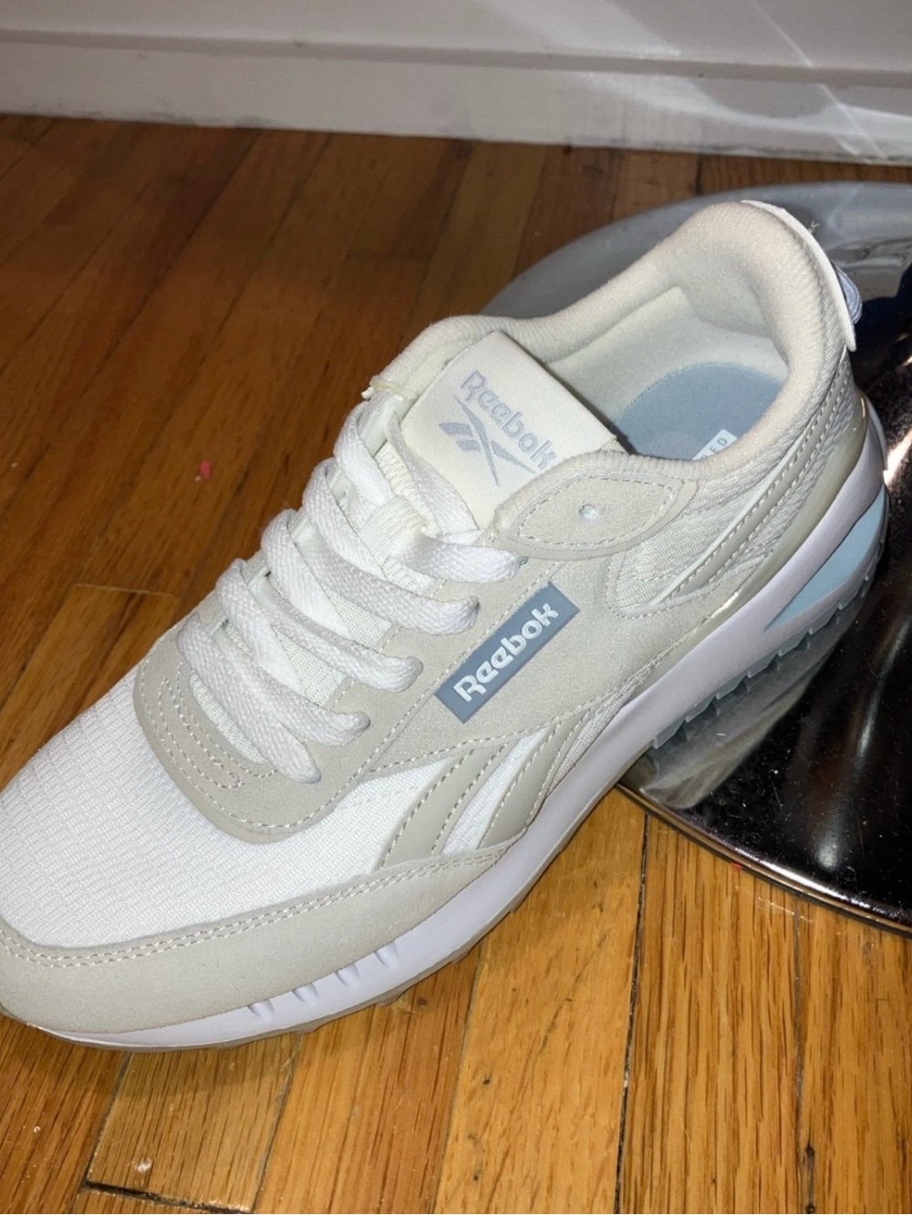 Reebok Women's White and Light Gray Athletic Sneakers with Subtle Blue Accent